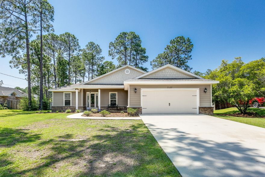 Stunning home in Holley By The Sea! 4 bed, 2 bath home is move in ready, wood laminate flooring in the open concept living room with high ceilings. The kitchen has many upgrades; granite counters, soft close cabinets, touch faucet, under cabinet lights and stainless steel appliances with a breakfast bar and dining area. The bonus sunroom has plenty of space and natural lighting and is heated/cooled allowing for many uses. The main suite is spacious with high ceilings, main bathroom has a soaker tub, dual vanities and updated tile shower that will have a glass door installed before closing. The backyard is huge with a shed that conveys as is. Home is wired for ADT security system. Custom blinds convey.