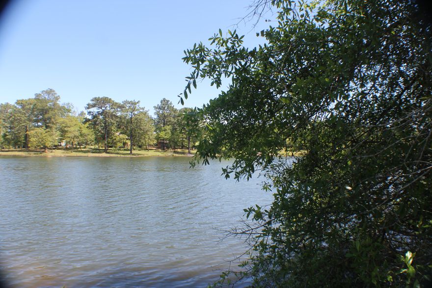 Lakefront homesite!!! Bring your house plans!! 1.85 AC level ground to build you dream house!! Lovely neighborhood and additional land available!!