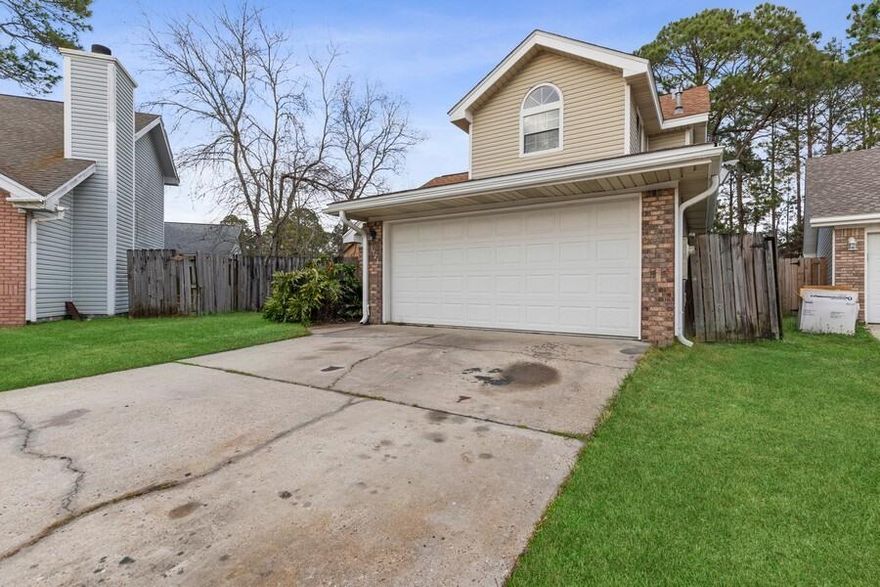 Updated home with a garage! This Fort Walton Beach home was just recently updated! The seller put a lot of work in to make a great new home for you! It has tall vaulted ceilings in the living area giving it a grand feel! A lot of natural light flows throughout the open Floorplan. With the kitchen overlooking the main living space, it gives you a beautiful flow for entertaining or whatever you imagine! The main bedroom is spacious and has a large en suite. Two additional bedrooms are situated upstairs. Upstairs, you will also find a full bath for guests. It really is a gorgeous home with a large two car garage, open, spacious, and a fenced-in backyard. What more could you need?