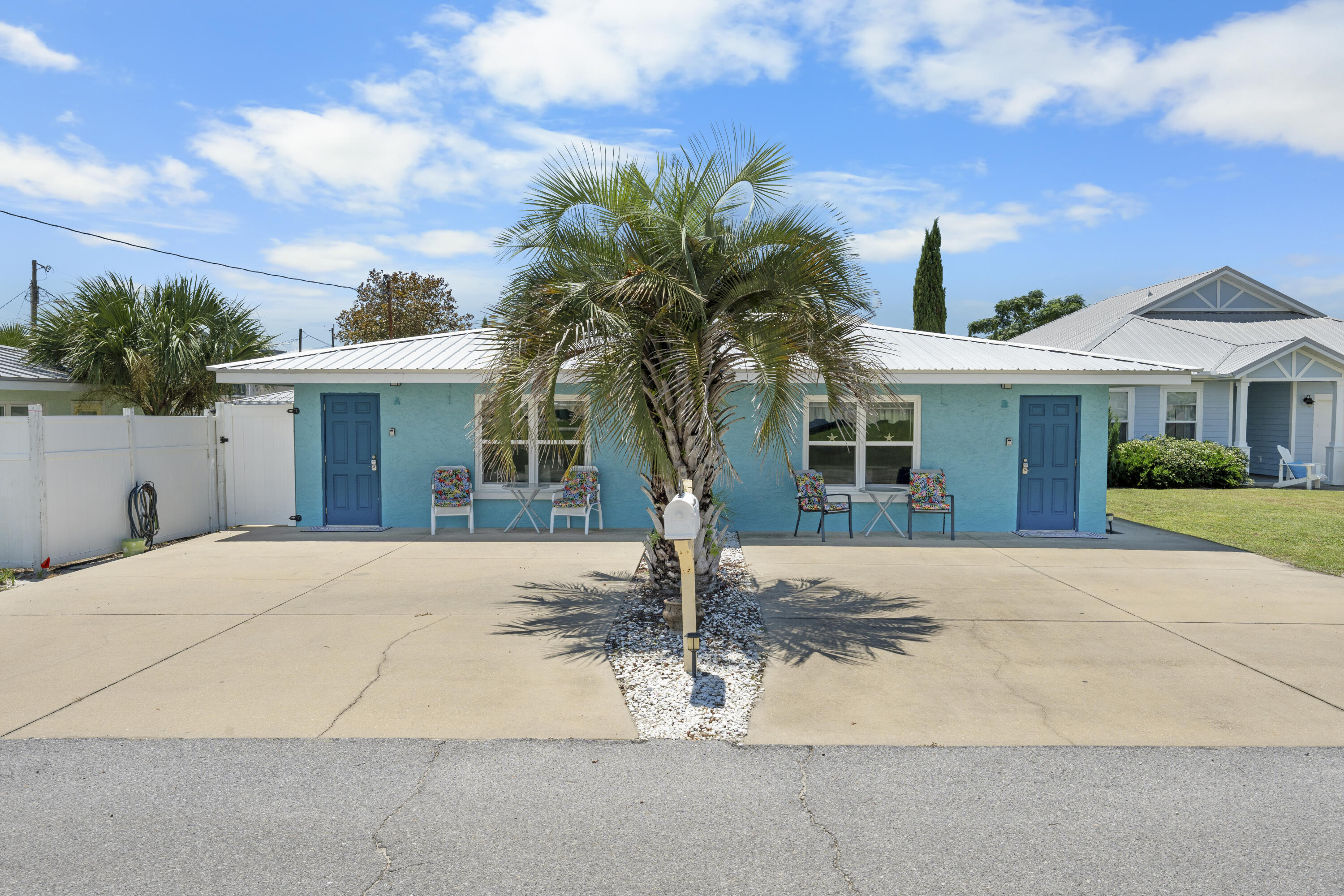 Welcome to 21927 Bataan Avenue, a charming and versatile duplex just 0.1 miles from the pristine Gulf waters on Panama City Beach's sought-after West End. Offering two self-contained one-bedroom, one-bath residences, each with 560 sq ft of thoughtfully designed living space, this property combines the relaxed feel of a coastal retreat with the income potential of a proven rental performer.Both units feature original terrazzo floors--a timeless, low-maintenance classic perfect for beach living--along with full kitchens, open living/dining areas, and pull-out sofas to accommodate up to four guests per side. The lock-out door between units adds valuable flexibility, allowing the property to be rented as two separate spaces or one larger home for extended families or groups. A shared laundry room provides added convenience, while parking for four vehicles ensures easy access for owners and guests alike.
The backyard is a true extension of the living space, offering a covered dining area that's ideal for shaded lunches, morning coffee, or relaxing evenings after a day in the sun. With a manageable lot size of 0.07 acres, upkeep is minimal leaving more time to enjoy the beach just moments away.
The West End location is one of this property's strongest assets. Known for its low-density, laid-back atmosphere, the neighborhood offers peace and privacy while still placing you within walking distance of multiple public beach accesses and the popular Sunnyside Grill. A short drive connects you to the boutique shops, dining, and events of Carillon Beach, Rosemary Beach, and Alys Beach destinations that keep guests coming back year after year.
Currently self-managed and generating solid returns, 21927 Bataan Avenue is ready to continue as an income-producing property or transition seamlessly into a personal beach retreat that pays for itself when you're away. Whether you envision hosting vacationers, gathering with friends and family, or holding a coastal asset with strong appreciation potential, this property delivers on location, flexibility, and charm.
