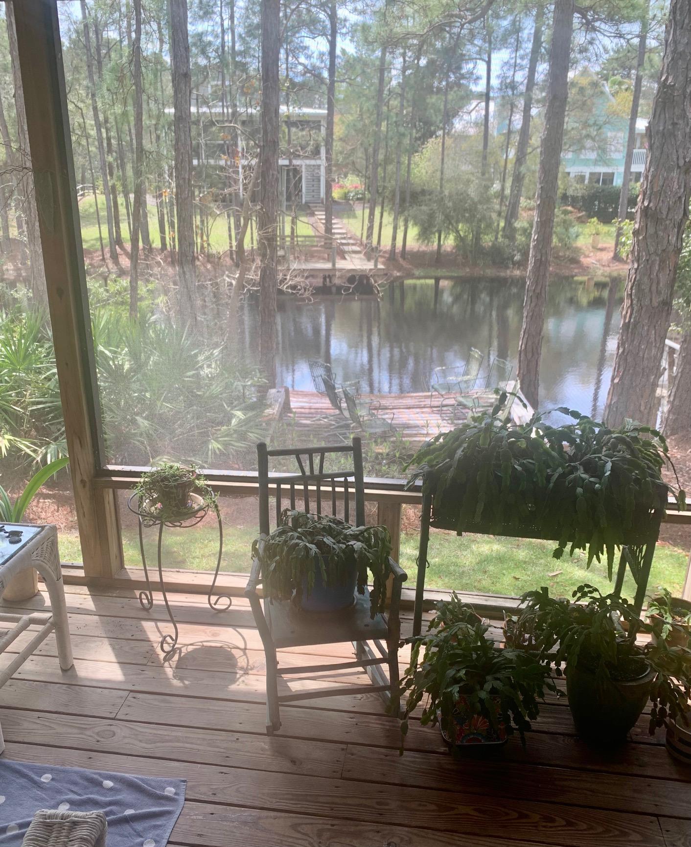 Welcome to Lakewood at Seagrove! This CANAL FRONT CORNER UNIT townhouse features a private deck on the Eastern Lake canal and wrap around porch as well as a balcony off the loft bedroom upstairs. Both the downstairs master and the loft bedroom have ensuite full baths. The main level is open for entertaining and the living area has vaulted ceilings. Tons of windows and 3 sliding glass doors offer tons of natural light and views of the water and beautiful scenery surrounding this oasis. This property would be great for a primary residence, second home, or the savvy investor. Property is being sold AS-IS and WILL need renovations. Don't miss out! These DO NOT come available often!!*Professional photos coming soon.*