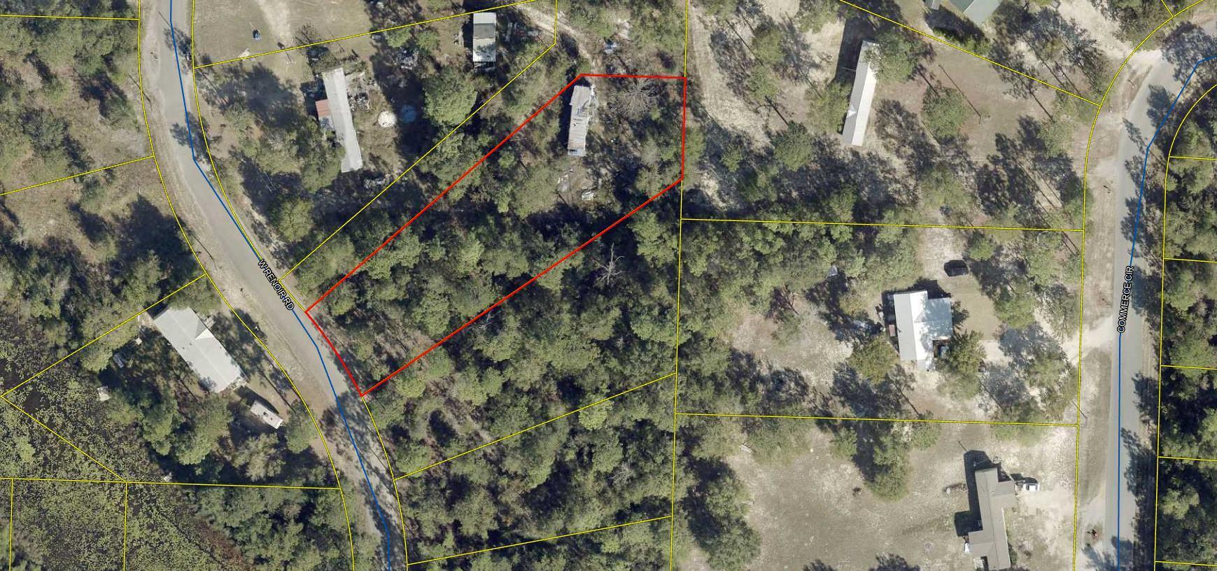 Well elevated lot for that new home to be built or manufactured home. Lot is presently wooded. City water available, tap fee not paid.
