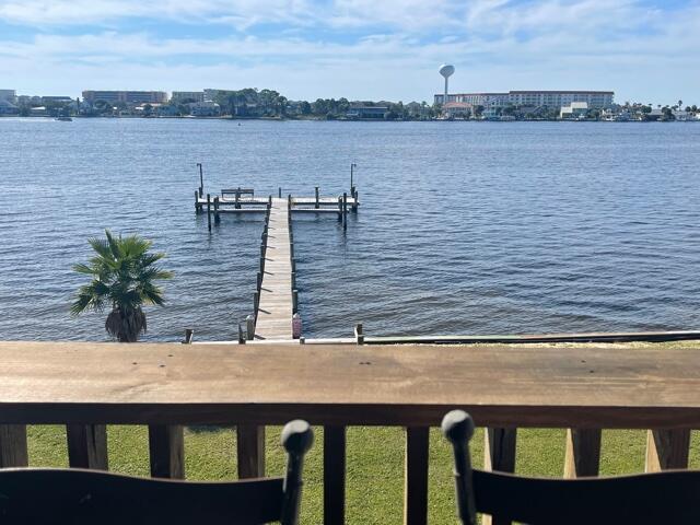 Gorgeous waterfront condo - this owner has updated the 2 bedroom, 1.5 bath unit and it has absolutely stunning views! Downstairs you have a full kitchen, bright living room with sliding glass doors out to your private balcony overlooking the water, and a half guest bath. Upstairs are two nicely sized bedrooms (one with a great water view) and a full bath. Updated lighting, flooring, and neutral paint. Stainless appliances (including flat cooktop stove). Water/trash included in rent. Pets may be considered on a case by case basis with prior owner approval and a non-refundable pet fee. No smoking, including vapes.