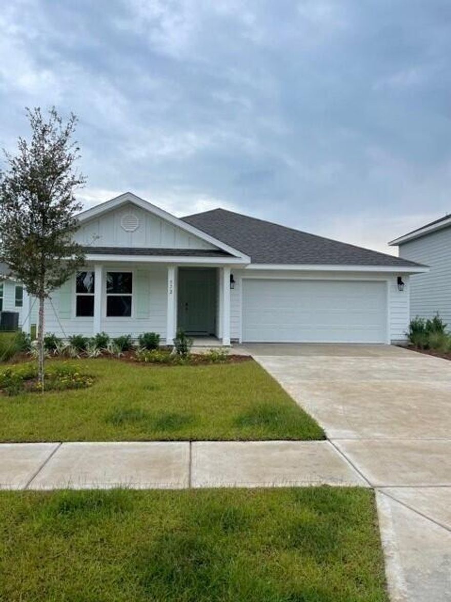 Call us today this will not last long! Make this BRAND NEW home yours! This one story, 4 bedroom, 2 bath with a 2 car garage home is located in Hammock Bay! EVP flooring, carpet in all bedrooms, stainless steel appliances,recessed lighting, separate shower and tub in master bathroom, large master closet, covered patio and so much more! neighborhood close to all schools.