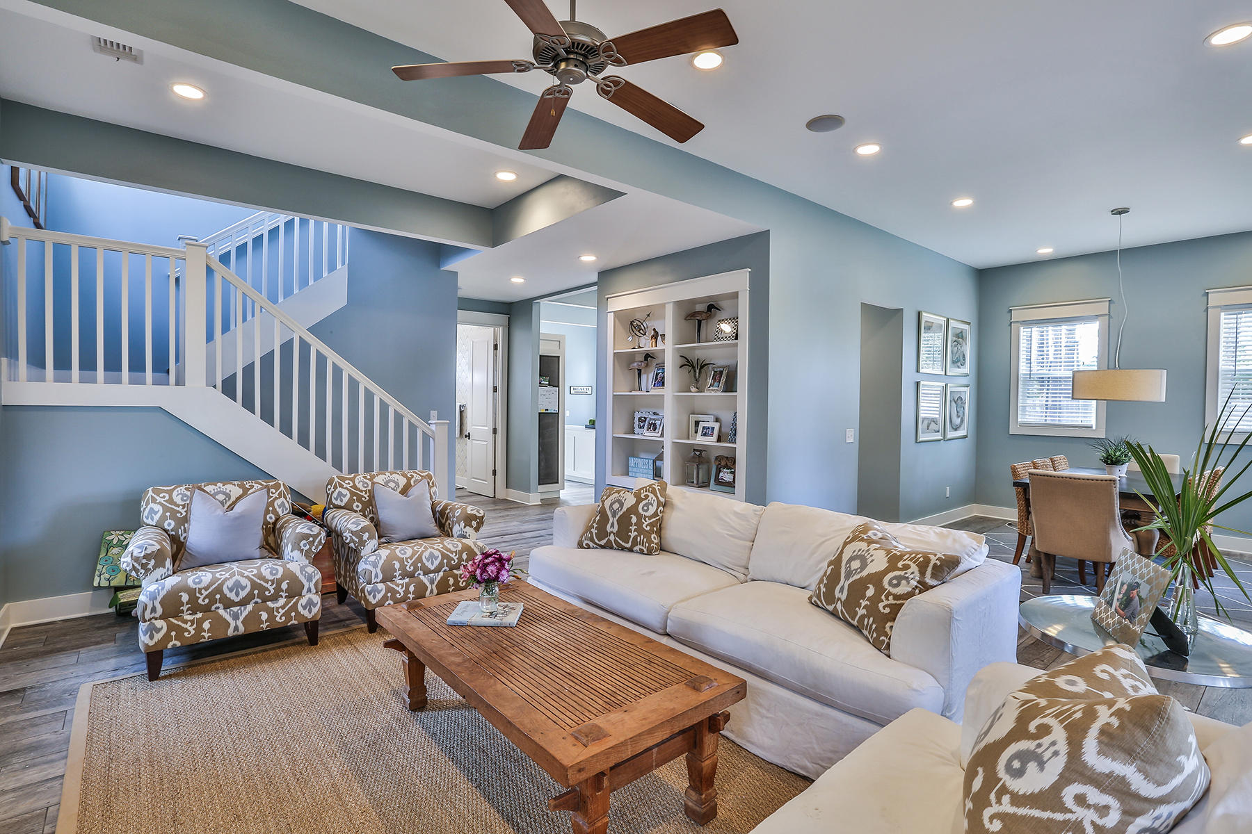 This beautiful, cottage-style home across the street from Choctawhatchee Bay has undergone significant renovations over the last five years, transforming it into a chic, yet comfortable showplace. At its heart is a crisp, coastal contemporary kitchen with quartz counters, coordinating glass tile back splash, stainless steel appliances, and center island. A separate beverage cooler is within easy reach of French doors leading to the over-sized paver patio with fire pit in the fenced back yard. Low-maintenance tile throughout the 1st floor passes as weathered, wide-cut hardwood without a 2nd look. Joining the kitchen on the 1st floor are the open living and dining room areas, an airy bath with designer wallpaper and basin sink, as well as a guest bedroom currently used as a home office.