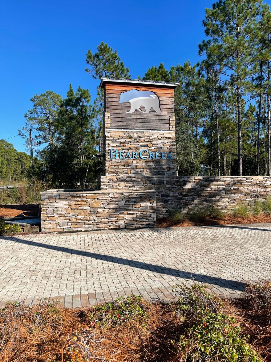 Photos coming soon!!!!  This is a fantastic lot to build your Dream Home in Bear Creek.    Bear Creek is a gated community which is near Choctawhatchee Bay, the Emerald Coast and the beautiful beaches of 30A. This neighborhood has high class amenities like Tennis, Pickle ball, Basketball Courts, a Fitness Center, a Playground for the kids and a Community Pool. The lot is high and dry, in an X flood zone with no wetlands and located just steps to all of the Bear Creek amenities.