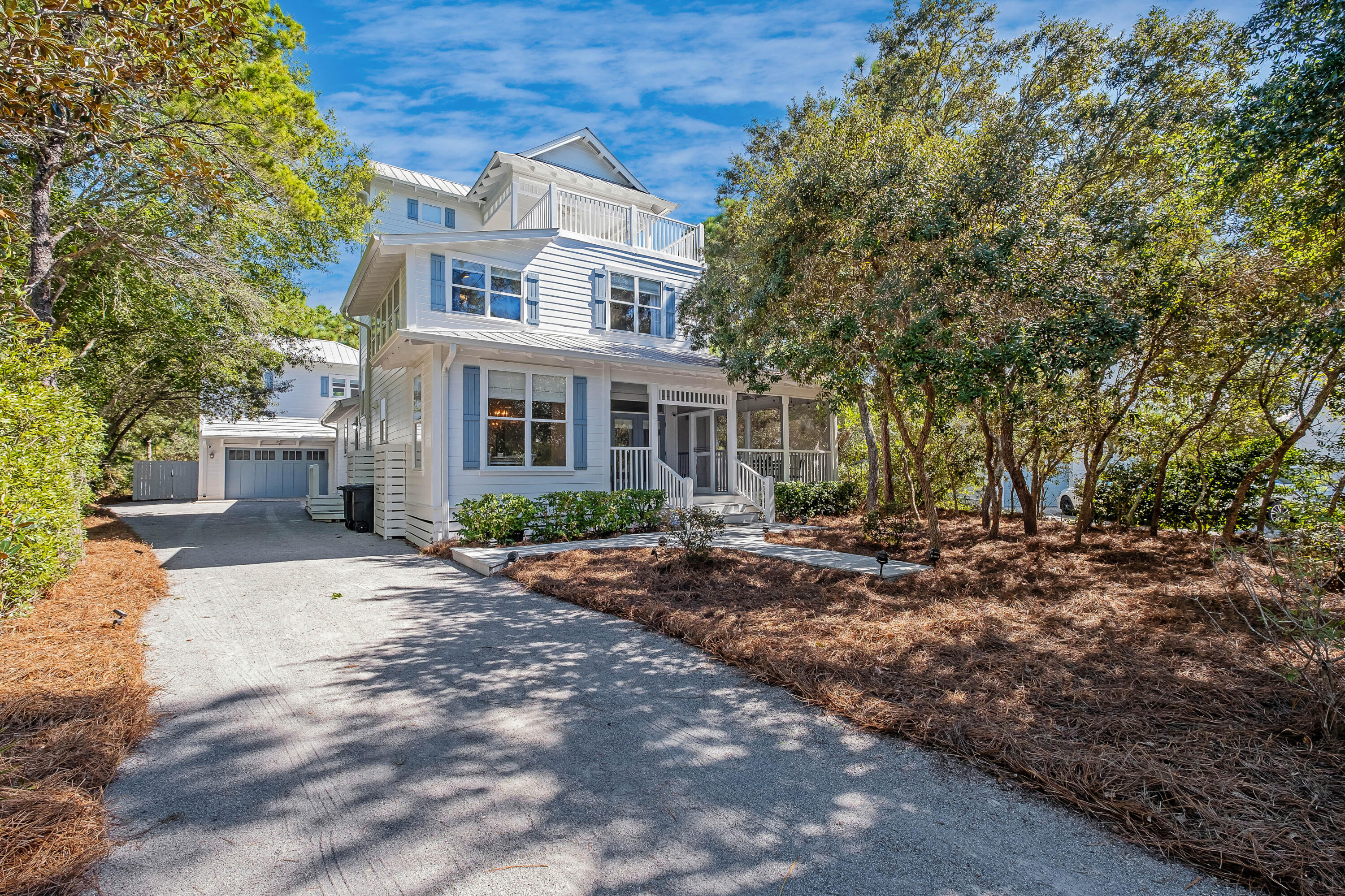 Welcome to Grove by the Sea. One of the most coveted neighborhoods in Seagrove. The old Florida feel and  private setting while being located in the middle of Seagrove Beach is hard to find & offers easy access to the beach, 30A, Seaside, Watercolor, & all that Seagrove has to offer. This four bedroom, fully renovated home has it all. The main house consists of 3 bedrooms (plus bonus room) and 3-1/2 bathrooms. Master, kitchen, dining & living area are all located on the 1st floor making the home a great primary, secondary or vacation rental. The separate carriage house/guest quarters offers an additional living area, bedroom, & bathroom. When renovated, gas was connected incorporating a gas stove & tankless WH. Relax on the multiple covered, screened porches and the rooftop deck. Once out back enjoy the hot tub and huge back yard. This corner lot is one of the largest in the neighborhood creating abundant back yard space and parking both in garage and driveway. Grove by the Sea has two neighborhood pools and easy beach access just across Hwy 30A. You have to see the neighborhood to truly appreciate it. When developed in the mid 90s, the developers paid incredible attention to layout giving each home the space it deserves and with the vegetation grown up the privacy is unmatched as a neighborhood. 