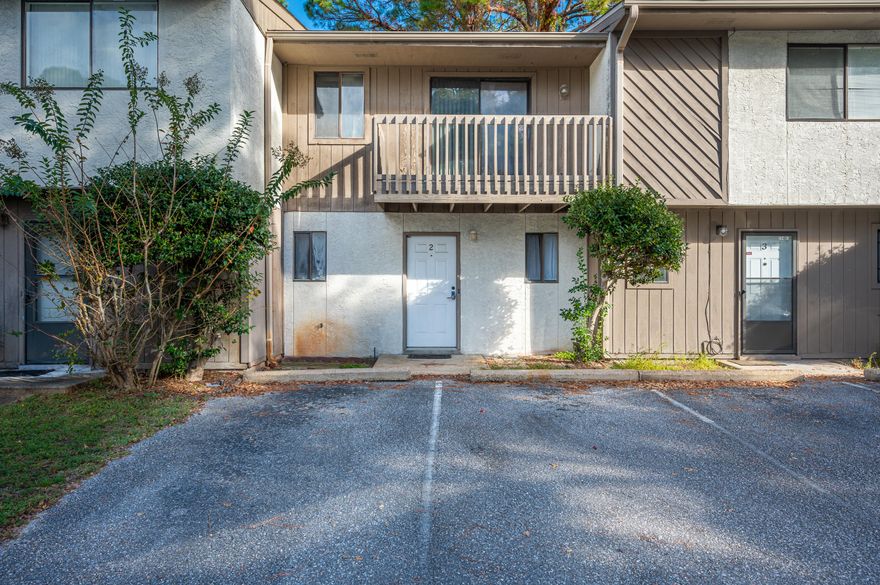 DUE TO MULTIPLE OFFERS, A HIGHEST AND BEST DEADLINE HAS BEEN SET FOR 3:00 PM THURSDAY, NOV 4TH. This quiet townhome is ideal for an owner user and/or investor.  Located a short walking distance from Downtown restaurants and retailers, and only a minutes drive to white sandy beaches, tis You will not be disappointed with all there is to do just outside your door.  The neighborhood amenities include a public boat launch and water access, parks, disc golf, tennis courts and walking trails.  The fenced in yard is the ideal place to store your bike and outdoor equipment.  This home is being sold as is with a new roof installed in 2021.  Both bedrooms are located on the second floor with a large bathroom and laundry room between.