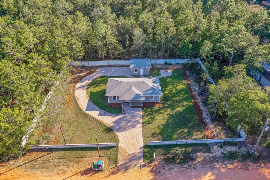 Immaculate home centrally located between Defuniak Springs & I-10 in Mossy Head. 10 min to Defuniak Spgs or I-10 & Hwy 285, 20 min to Crestview & less than 30 min to Eglin AFB or 7th Special Forces. 5 min to best bbq I've had in my life (Simply Good BBQ). Fully Fenced perimeter. 2 car detached garage. Brand-new fire pit on pavers. Crown molding throughout. Definite a must see. Schedule your showing today!
