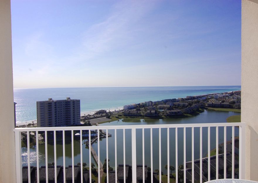 Supreme location...western facing, 20th floor with gorgeous gulf & bay views and year round sunsets. Beautifully decorated 2 bdr, 2 ba with separate BUNK ROOM. Tile flooring throughout, with granite counter tops and stainless steel appliances in the kitchen. This one won't last long. Wonderful amenities of Ariel Dunes II includes deeded beach access, 4 pools, fitness center, tennis courts, Seascape golf course and the Cabana Cafe. This is a great property for a beach retreat and a turn key investment property. The master suite has private access to the large balcony, separate shower and tub and dual vanities. The condo also comes with outside storage closet and so much more.