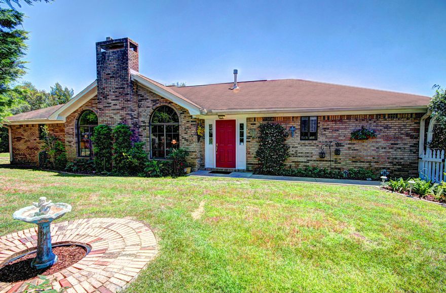Lighted pathway and arbor lead to a private court yard and main entrance to this approximately 2300 sq ft brick home. Brand new roof as of September 2015. Living room features palladium windows, cathedral ceilings and a brick fireplace. Large kitchen and open dining room lead to 22'X 12' all season sun room. Master bedroom boasts tray ceiling, walk-in closet, and en-suite with whirlpool tub. Guest rooms 17'x11' with large closets flank guest bathroom. Plenty of storage throughout. Oversize garage has separate central heating and cooling system. Factory made 20'x 14' workshop has power and window A/C as well. Flood zone X and minutes from Gulf of Mexico, Destin Elementary, Joes Bayou and Destin Harbor.