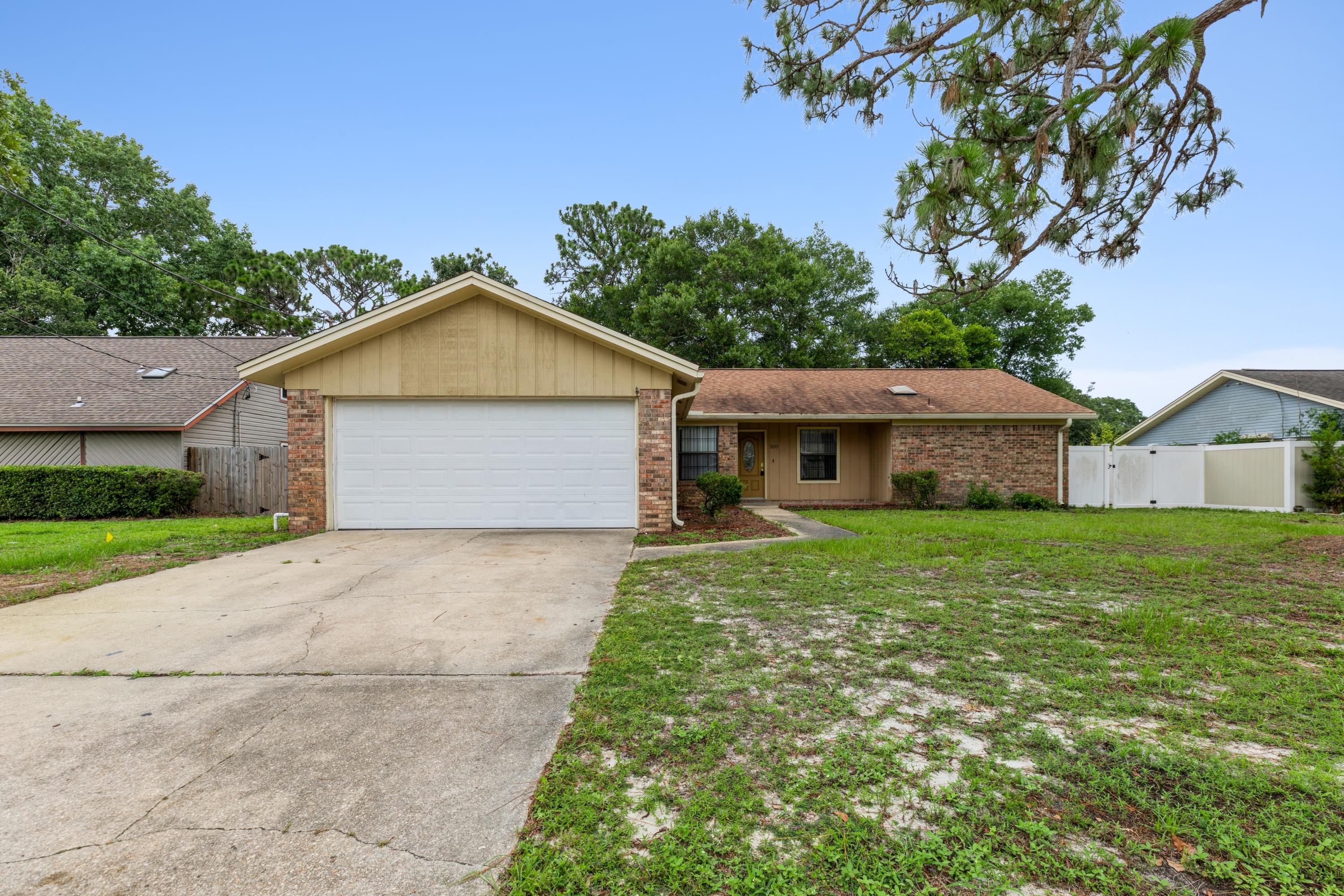 Absolutely Adorable and MOVE IN READY!! This 3 bedroom, 2 bath, 1492 SF home has a ton of upgrades to include: New Interior Paint throughout to include the ceilings, New Exterior Paint, New Carpet and Padding in Bedrooms and Living Areas , New Vinyl Flooring in Kitchen and Hallway, New Light Fixtures and New Stainless Appliances. Located in a wonderful neighborhood with a Community Park just 100 yards away. This home is also located in very close proximity to Hurlburt Field, shopping, and the BEST Beaches in Florida. Roof was installed in 2011 and the A/C System was installed in 2013. Don't miss this opportunity to own this wonderful home. Buyer to verify all dimensions.