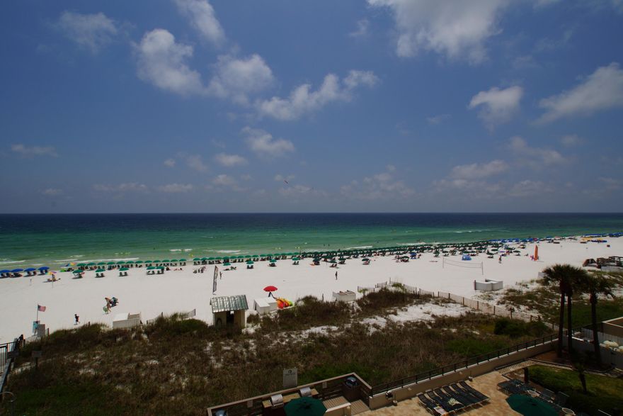 This 2 bedroom 2 bath unit in Emerald Towers offers amazing views of the Gulf. Tastefully furnished in a contemporary elegant decor with great West Indies accents. Features include tiled flooring throughout, granite countertops in kitchen and baths, a wet bar with an icemaker, mirrored wall in living/dining area and access to the balcony from the living area and the master suite. Emerald Towers amenities include a gated entry, beachside pool with grilling area, whirlpool, tennis courts, community room and fitness facility. Located close to all that Destin has to offer including restaurants, shopping, golfing, fishing, and much more! The perfect place for your vacation get-away!