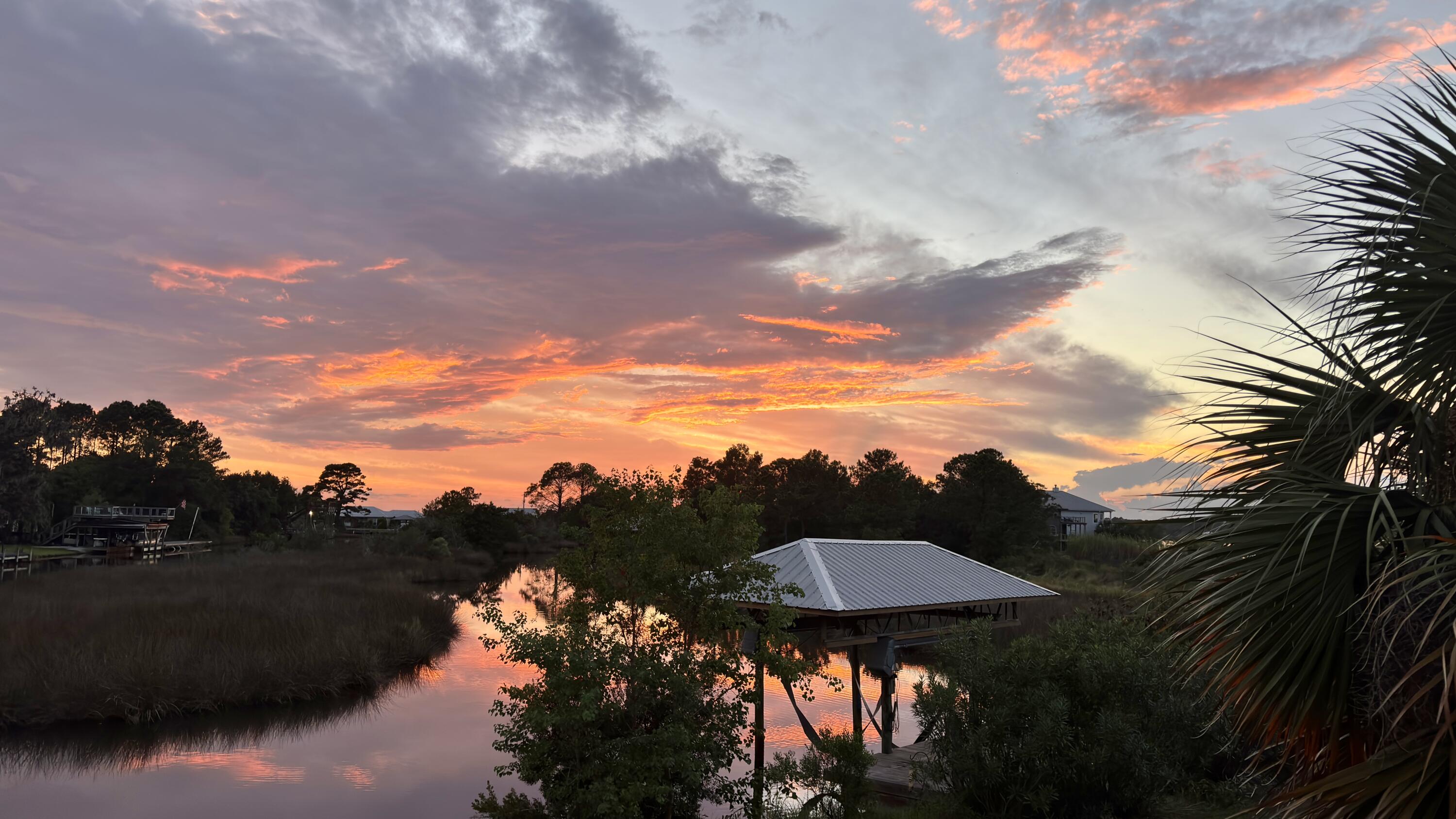 Set on 3/4 acre and surrounded by 300 feet of waterfront you have found your slice of paradise. This home is tucked away at the end of a dead end street but still close to all the conveniences of up and coming Freeport. Sit on your covered porch, watch the sunset and let the noise of the world be replaced with the sounds of nature. Or take your boat out from the covered boat dock and lift to watch the sunset over La Grange Bayou! It doesn't get any better than this!
