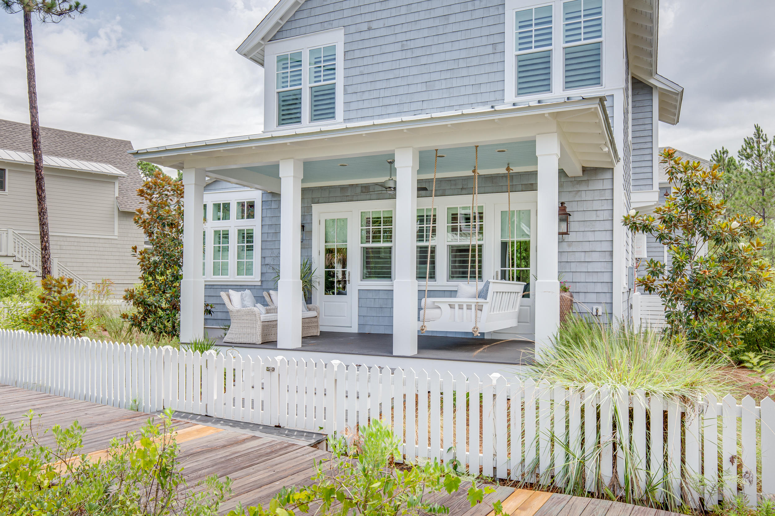 Stunning masterpiece in Watersound West Beach. With over 3500 sqft of living space and 2 fabulous porches, this home offers a tremendous floor plan with an open gourmet kitchen, dining, and living area that is perfect for entertaining. The first floor features a master bedroom suite, with his and hers closets, as well as luxurious soaking tub and steam shower. The second floor offers an additional 2 bedrooms with ensuite baths and bunk room with 4 twin bunks. Carriage house with 2 car garage with built in storage, houses the 4th bed and bathroom and outdoor shower.New exterior irrigation on city water, built in master closets, some Christian Lacroix wall paper, most lighting is Arteriors, cabinets to ceiling and built in filtered instant hot water in kitchen, built in sonos on main.