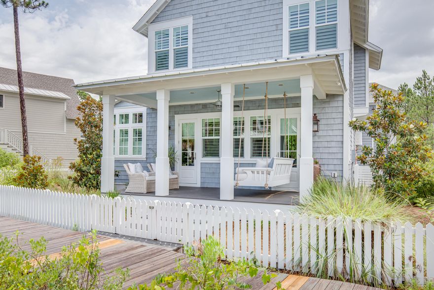 Stunning masterpiece in Watersound West Beach. With over 3500 sqft of living space and 2 fabulous porches, this home offers a tremendous floor plan with an open gourmet kitchen, dining, and living area that is perfect for entertaining. The first floor features a master bedroom suite, with his and hers closets, as well as luxurious soaking tub and steam shower. The second floor offers an additional 2 bedrooms with ensuite baths and bunk room with 4 twin bunks. Carriage house with 2 car garage with built in storage, houses the 4th bed and bathroom and outdoor shower.New exterior irrigation on city water, built in master closets, some Christian Lacroix wall paper, most lighting is Arteriors, cabinets to ceiling and built in filtered instant hot water in kitchen, built in sonos on main.