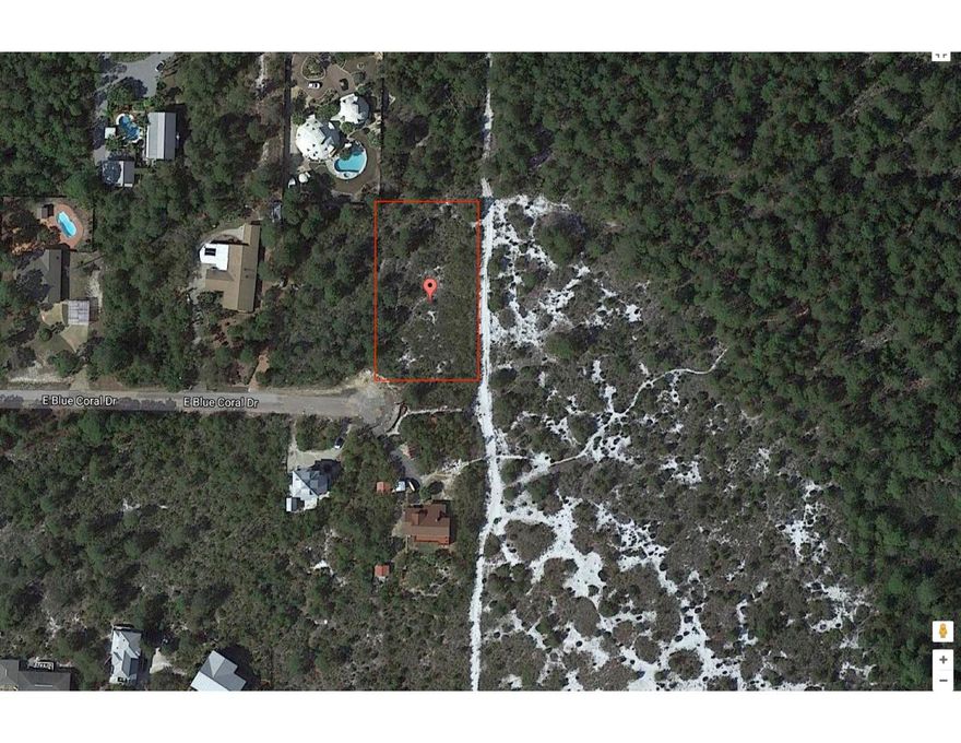 Great opportunity to own a half-acre lot that backs up Topsail state park in Pines of Blue Mountain.The Pines of Blue Mountain is a 35+ acre community located in the heart of Blue Mountain Beach along Scenic Highway 30A. The community features large home sites which allow for the capability of building a home, guest house, and pool while still maintaining privacy. The home sites have no build out time, no HOA, and no short-term rentals.
