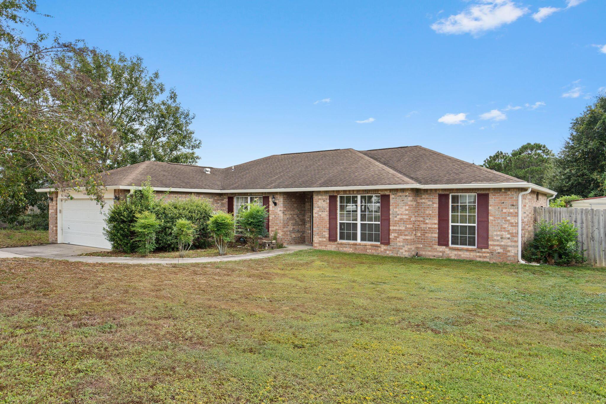 Welcome to 1211 Northview! This 4 Bedroom 2 Bath Plus Bonus Room home has all of the checks for your boxes. Located below I10 in the Southern part of Crestview offers easy access to Duke Field, Eglin AFB, or the local beach, as well as easy access to area schools, restaurants, and shopping. The well-designed floor plan offers not only a split floor plan, but it also adds a bonus room to be used as you desire. The Primary Bedroom is spacious, and the Primary Bathroom offers a Double Vanity, a walk-in closet, and a separate tub and shower. The Kitchen offers plenty of cabinet space, a large pantry, and a breakfast nook. The backyard is fenced in and has a covered patio for all of the summer cookouts. The perfect location and all of the extras you have been looking for!