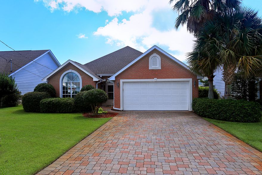 A beautifully maintained lakefront home with a fantastic floorplan! The many features include an enclosed Florida room w/scenic view of lake, custom leaded glass front door & sidelights! Many more features include but are not limited to the following: Three sides brick with stucco accents; rear elevation features Hardiplank siding, brick-paved driveway, fireplace w/gas logs and architecturally inspired mantel, 12'' ceramic tiles in living areas, electric range, GE side-by-side refrigerator, hard surface counters, separate food pantry, laundry room w/ stack washer/dryer remain, electric water heater, 18' high ceilings in living great room with decor niche, wood floor in sunroom, 1 year old irrigation system w/lawn pump & Rid-o-Rus, beautiful wood pergola on back patio.