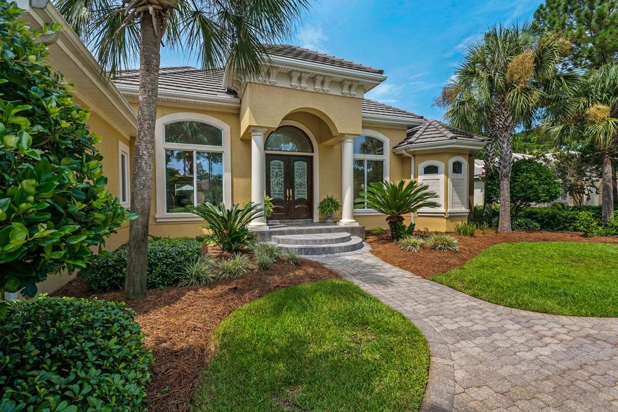 New Look & New Price with Golf cart included! This one level estate located in the prestigious gated neighborhood of Burnt Pine offers open architecture with astonishing indoor and outdoor living space, ideal for entertaining. Glass lanai doors open the living room to the expansive outdoor pool area, showcasing the natural beauty of the resort. This unique location provides surprising privacy and picturesque views of the #6 tee box and fairway green of the renowned Burnt Pine golf course. Imagine watching golfers compete from the comfort of your private hot tub or hosting a family barbeque from the outdoor kitchen on your sprawling pool deck. Relax and read a book in the plush seating area of your master bedroom suite complete with morning kitchen including refrigerator and wet bar.