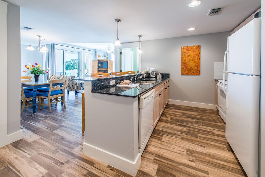 This is the most coveted position in The Village at Baytowne Wharf! This two bedroom two bath is located on the fourth floor of Observation Point overlooking the events plaza. Enjoy all of the shows, parades, movie nights, fireworks and events or take in stunning sunsents over the Choctawhatchee Bay from the comfort of your own balcony. Beautifully updated with new grey porcelain wood plank tile in the kitchen, living room, and dining area for easy care and maintenance. There is brand new carpet in the bedrooms, a brand new sofa sleeper and new patio furniture on the large balcony. Observation Point owners have exclusive access to the amenities terrace including resort style swimming pool, fitness center, and The Founders Club featuring a game room with pool table, bar and a balcony.