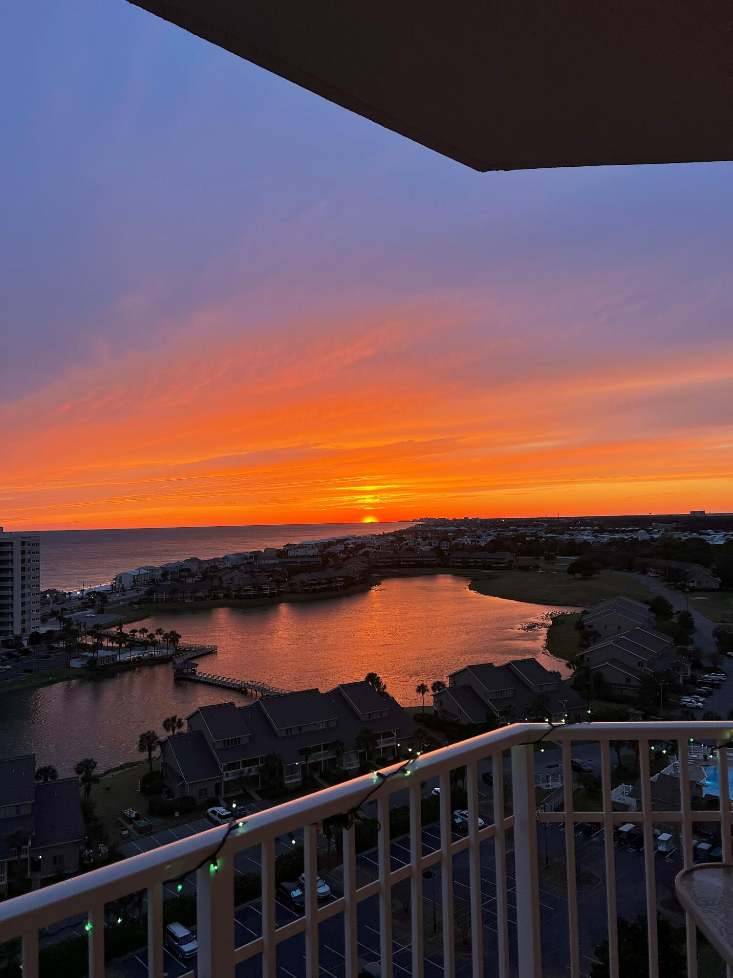 RARE West End 14th-floor 3bed/3bath condo with spectacular wraparound balcony for sunset views 365 days/yr in Seascape Resort, a gulf-front private gated community with on-site beach, golf, pools, free tennis & pickleball, fishing, and restaurants. The Ariel Dunes building has 3 dedicated pools, a gym, and a restaurant. This condo has unique WEST views along the beach to Destin Harbor with decks facing West, South & North, that are accessed by 4 sets of sliders. The West-end location adds windows for the most natural light possible, so guest bedroom enjoys sunsets over the gulf and its private North deck is perfect for coffee at sunrise/sunset over Choctawhatchee Bay. Recent renovations: custom bar-counter/cabinets, LVP throughout, water heater.