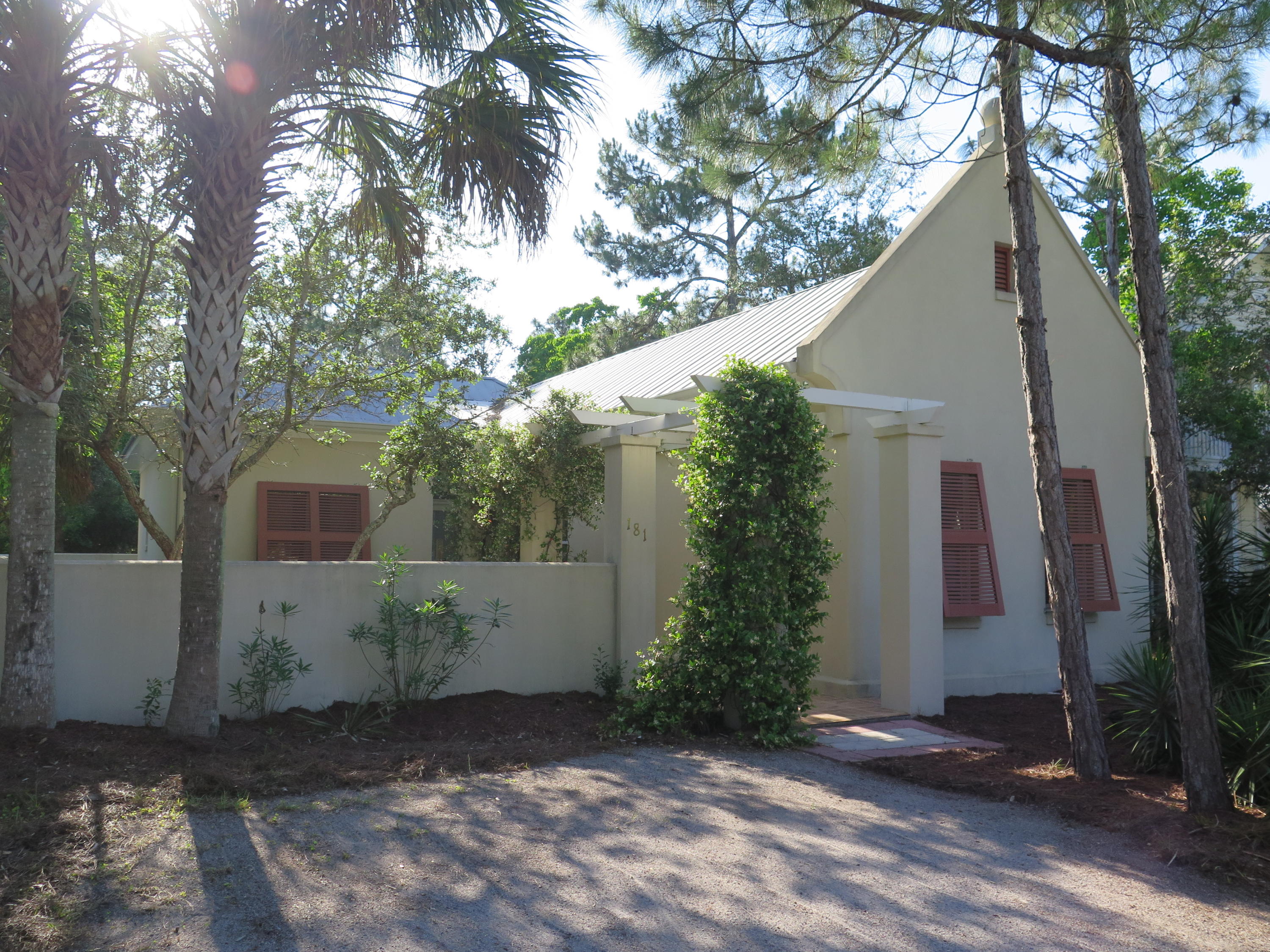 Seagrove Beach - Quality ICF construction located just a quarter mile to the beach. This inviting one story beach house boasts vaulted ceilings noticeably apparent as you walk through the front door. Upon entering before you is the main living space open to a gracious kitchen, dining & living area. Further to the north side of the home is a hallway leading to a guest bedroom, and spacious master suite with vaulted ceilings. Walk-in closet located in the master bath along with an owners closet. An additional guest bath centrally located right off the living area is equipped with a stackable washer/dryer. All main areas have tile flooring; the 3 bedrooms carpet. A sizable screened porch is located off the back of the house leading to a sun deck and private back yard. Room for a pool.