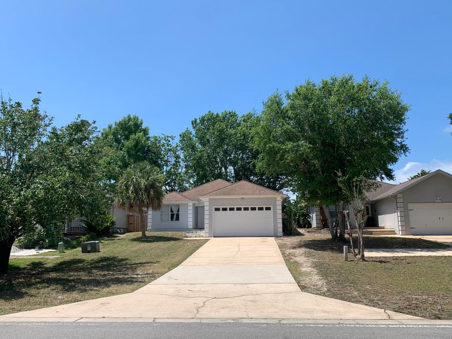 In the HEART of Destin, walking distance to the downtown Harbor, Emerald Grande, Crab Island, and all that Destin has to offer. This 3/2 home is completely updated. All new interior paint, floors, backyard fence, appliances (KitchenAid), light fixtures/ LED lights, and fire alarms throughout. Offers an oversized 2-Car Garage with a 6-Car Driveway, a cozy firepit, and brand-new barn doors. Spacious backyard is perfect for relaxing or hosting friends. The oversized Master Bedroom includes a walk-in closet. Also includes a Nest Thermostat and Security Cameras that connect via Wifi/App.Home history has only 2 owners, one of which was a second home for Atlanta builder. Current owner is military and home was lightly used since 2015 purchase.