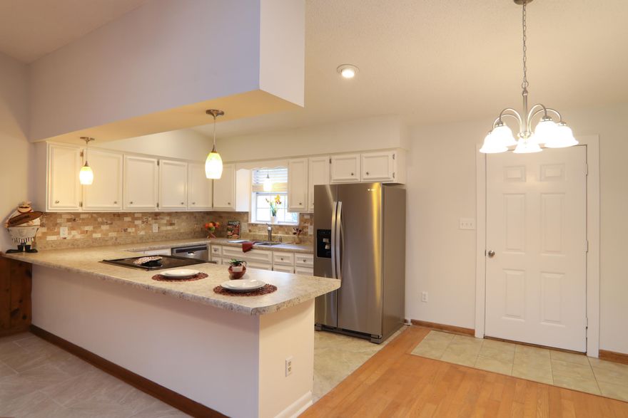 This cozy and charming home is move in ready and has everything you may need to call this home yours! Inside the home you will find beautiful hardwood flooring throughout, including the bedrooms. Inside the great room there is a cathedral ceiling, built-in bookcases, and a gas fireplace. The kitchen boasts a nicely sized breakfast bar and a dining area is located right next off the kitchen as well. Step outside and into the backyard where you will find an open patio perfect for grilling and small gatherings! Home is only 1.5 miles from Pensacola State College, less than 5 miles to Tiger Point Golf Course and parks, and just a couple minutes away from the Gulf Breeze Zoo!Co-agent has interest in the property.