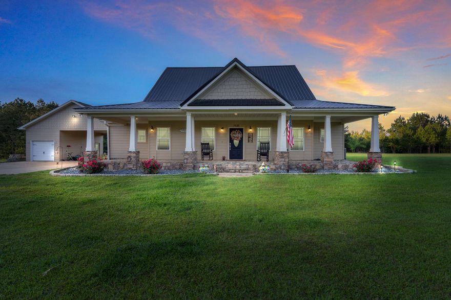 ACCEPTING BACK UP OFFERS. Luxury country living that is an easy commute to the Florida beaches, bases and shopping centers. Please take a look at this stunning 10 acre, custom built home that boasts 2800 SQ of living space with 4 bedrooms and 2 bathrooms. New metal roof and HVAC in 2018 . This beautiful home provides a unique landscape with hardwood trees, peach trees, custom cedar screened porch, free range chickens with coup and brand new 3 stall barn! One car garage/shop with covered 2 vehicle car port that also has a 30amp power hookup. Inside the home it features hand scraped 3/4'' solid oak floors in the living room, dining, hallway and foyer. Custom cabinets throughout home with 12''inch crown molding. The kitchen boasts huge island with exquisite stone wall.