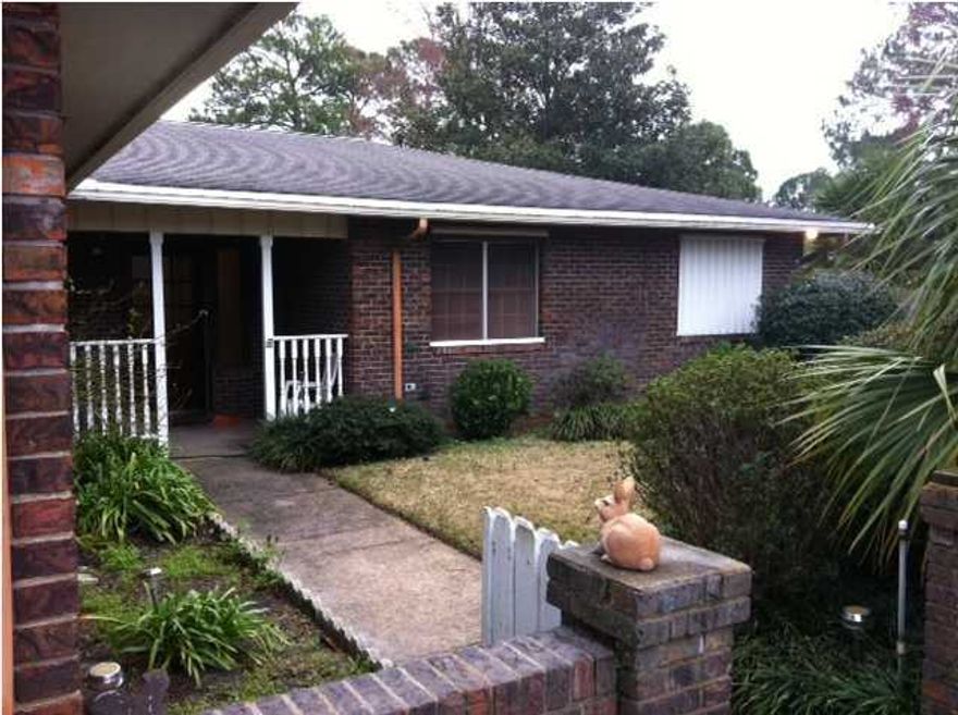 Large corner lot. Tile throughout, except bedrooms. Room for extra parking for boats, trailers, RVs. Screened in patio in back yard. Refinished cabinets in kitchen and bathroom. Brand new custom tiled shower in master bath. Ceiling fans in all bedrooms. Available September 26.