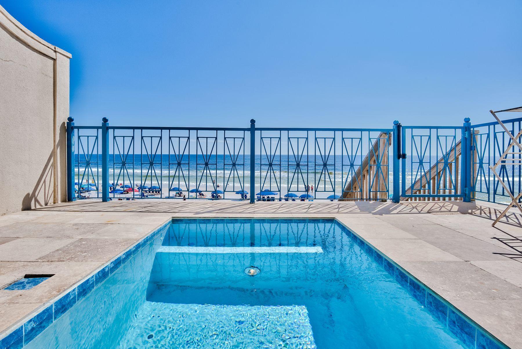 A gulf-front vacation retreat, this inviting home is primely located in Frangista Beach and offers ample entertaining space, elegant finishes, panoramic gulf views, and outdoor amenities. This residence is a coveted rental and features five bedrooms, including a fully-fitted bunk room, providing comfortable accommodations for up to 16 guests. Renovated and refurbished, highlights include beautiful hardwood floors, spacious suites, and a chef's kitchen with granite counters, custom cabinetry, and stainless steel appliances. However, it's the exquisite gulf views from balconies on all three floors that truly steal the show. A private plunge pool also overlooks sugar-white sand and emerald waters.