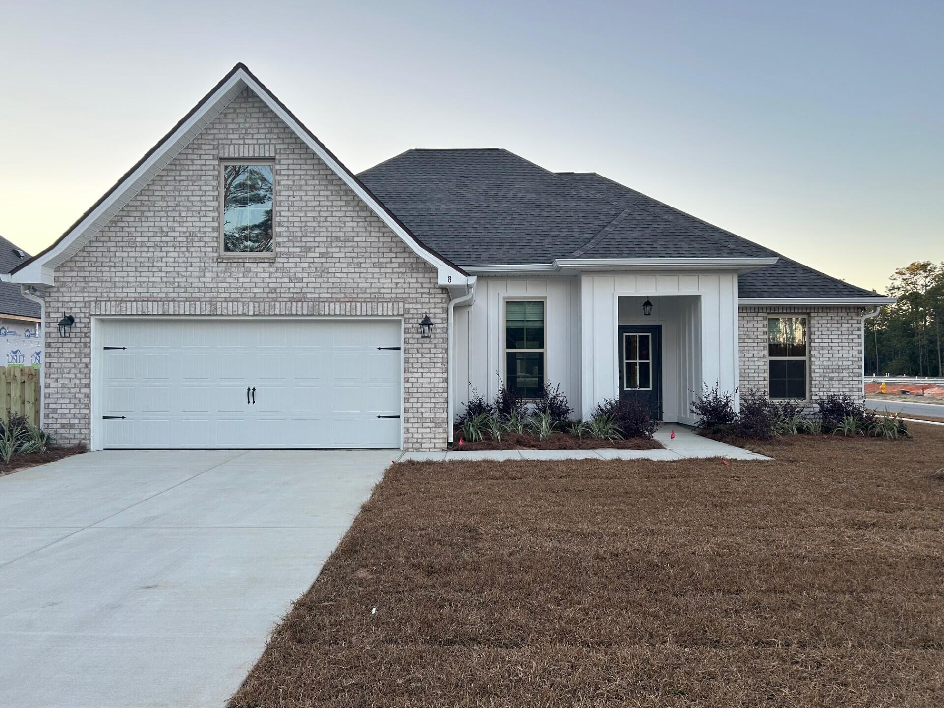 Located on a corner lot the ROSES V G in Bird Song at Hammock Bay community offers a 3 bedroom, 2 full bathroom, open and split design with flex space and computer desk/niche. Upgrades added (list attached).  Features: double vanity, garden tub, separate custom tiled shower, and 2 walk-in closets in master bath, tray ceiling in master bed, kitchen island, walk-in pantry, covered front/rear porch, crown molding, recessed lighting, framed mirrors, smart connect WIFI thermostat, smoke/carbon monoxide detectors, landscaping package, architectural 30-year shingles, flood lights, and more!Energy Efficient Features: water heater, kitchen appliance package, vinyl low E windows, and more! Energy Star Partner.