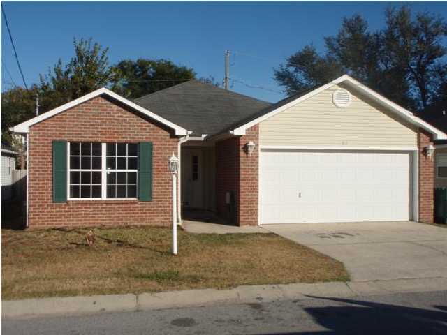 Great Location! Spacious home on Lauderhill Lane - located just off Hurlburt Road. VERY convenient to BOTH bases! Numerous upgrades include: wood floor in living room, tiled floors in the foyer, kitchen and baths and ceiling fans throughout. Fireplace in large family room (ornamental only). Double vanities and oversized shower in Master Bath, and treyed ceiling in spacious Master Bedroom. Privacy fenced back yard, 12'x 31' wood deck with built in swing. No smoking.