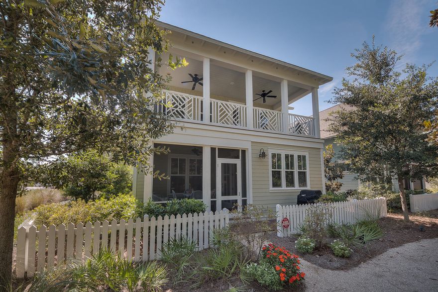 Nestled in a peaceful park environment, this gracefully designed 4 bedroom, 3 -1/2 bath cottage in the gated Watersound West Beach community is a private paradise, yet close to resort style amenities including, gulf access and community pools, outdoor grill and dining area with fire place, fitness center, parks and walking paths. With hardwood flooring throughout living areas and bedrooms, discover a bright and open floor plan, including a spacious Great Room with fireplace that flows into the pristine gourmet kitchen, complete with high-end stainless steel appliances, granite counters, glass subway backsplash, large island and attached dining area. A screened-in porch is the perfect spot to enjoy the cool breezes while taking in the gorgeous landscape.