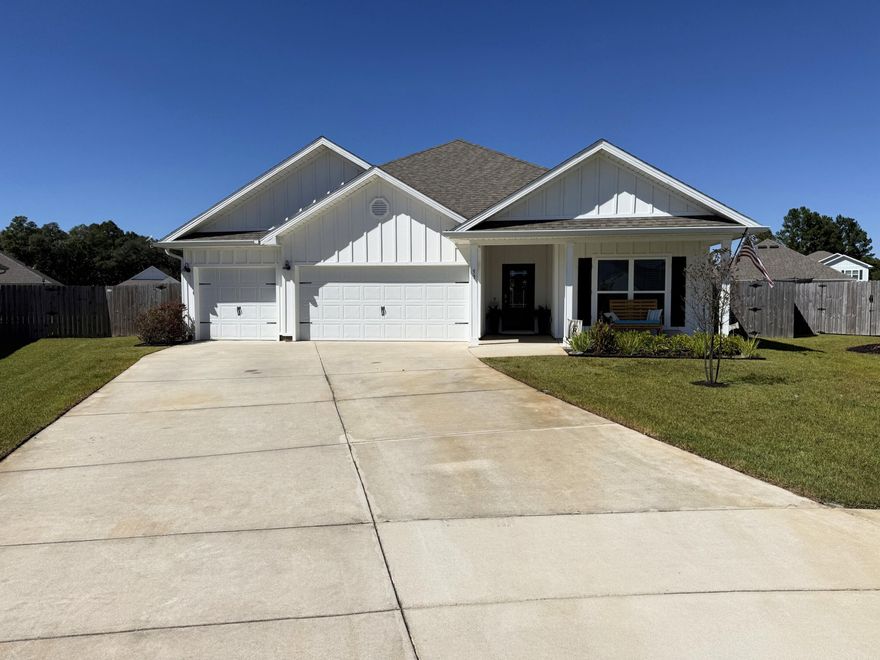 Discover the perfect blend of comfort and convenience in this charming 4-bedroom home located in the heart of Freeport. Situated on a peaceful cul-de-sac, this property offers an idyllic lifestyle with easy access to all Freeport has to offer.  This home offers a 3 car garage and a sizeable open floor plan featuring a large living room with natural light that flows into a kitchen featuring quartz countertops, stainless steel appliances and cozy island.This home is setup for the ultimate entertainment spot for your family and friends. Step outside into the screened in porch with sealed concrete, plus a large extended concrete patio for additional sun or spending your evenings watching the amazing sunsets or relaxing in your private, fenced backyard.  The master ensuite features dual vanity sinks, a separate glass-door shower, garden tub and large walk-in closet.  The three secondary bedrooms offer sufficient space and separation with two additional full bathrooms for the family or guests.  Enjoy your evenings on the cul-de-sac with your covered patio and luscious landscaping offering great curb appeal. Located just a quick drive from the Emerald waters of the Gulf and within a short distance from many boat launches into the Choctawhatchee Bay for your on water entertainment.  