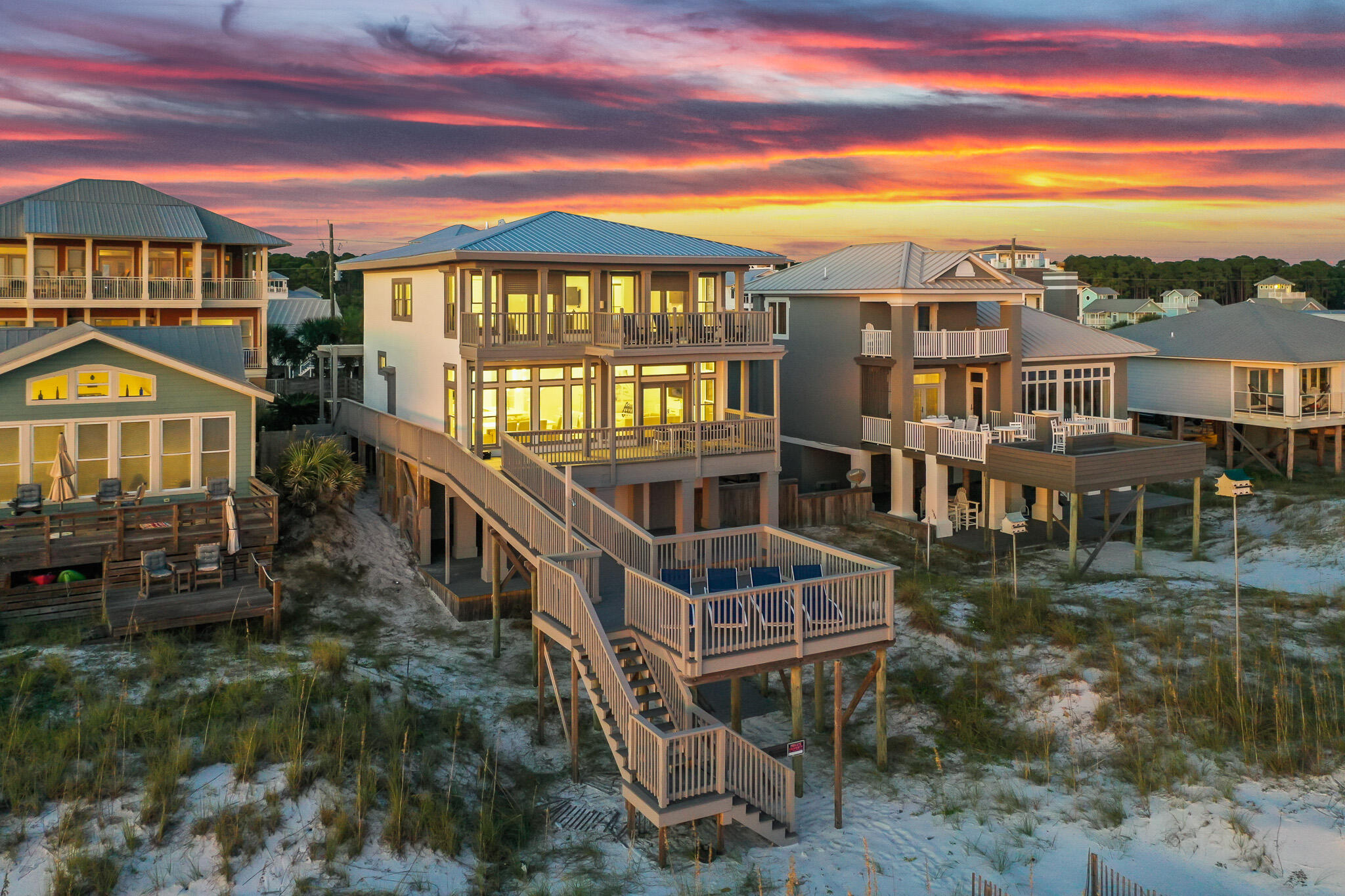 51' of gulf front on West 30A! This stunning gulf-front beach home offers breathtaking panoramic views of the Gulf of Mexico. Enjoy the spectacular gulf vistas from multiple rooms. There are 5 bedrooms, 4 baths, including a unique beach walkover with an additional sun deck (very rare and grandfathered in) perfectly positioned to take in the magnificent stretch of white sandy beach. 10' ceilings on the first floor, The large owner's suite adds to the home's allure. Remodeled home w new siding, windows, doors, baths, flooring and more. All fresh paint. New roof and HVAC appx 2021. Just a short distance from all of the great restaurants and venues 30A has to offer. Seller offering an attractive 3% mortgage rate. Contact us for additional details.