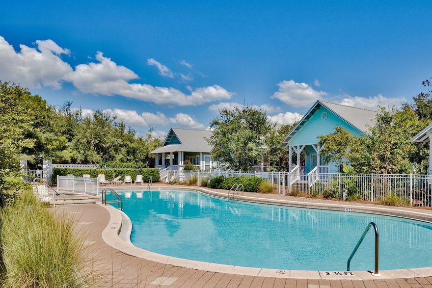 Newly Painted! This charming one story three-bedroom, two-bathroom cottage along Scenic 30A is for sale in the beautiful community of Cottages at Camp Creek. This cottage is being offered fully furnished and includes deeded beach access and a community pool. This home has plenty of parking for two vehicles as well as overflow parking located at the front of the subdivision just a few homes away. The private porch overlooks the community pool and nearby hot tub in the center of the neighborhood. The open living, dining, and kitchen area provide a nice spacious entertaining area. Gated, deeded beach access is conveniently located right across 30A.