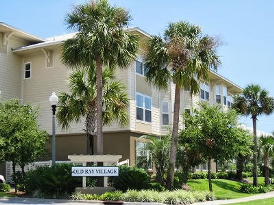 2 bedroom, 2 bath ground floor (end unit) located in the heart of Destin! Open floor plan, Kitchen features stainless steel appliances, granite counter tops and full length breakfast bar. Large living room with trey ceiling and crown molding. Nice size bedrooms, each with access to a bathroom. Secure/locked/heated/cooled entrance to the building where you enter a common area corridor with Travertine flooring, wood columns and crown molding. Room dimensions are approximate. Convenient to restaurants, entertainment, shopping and our world famous sandy white beaches!