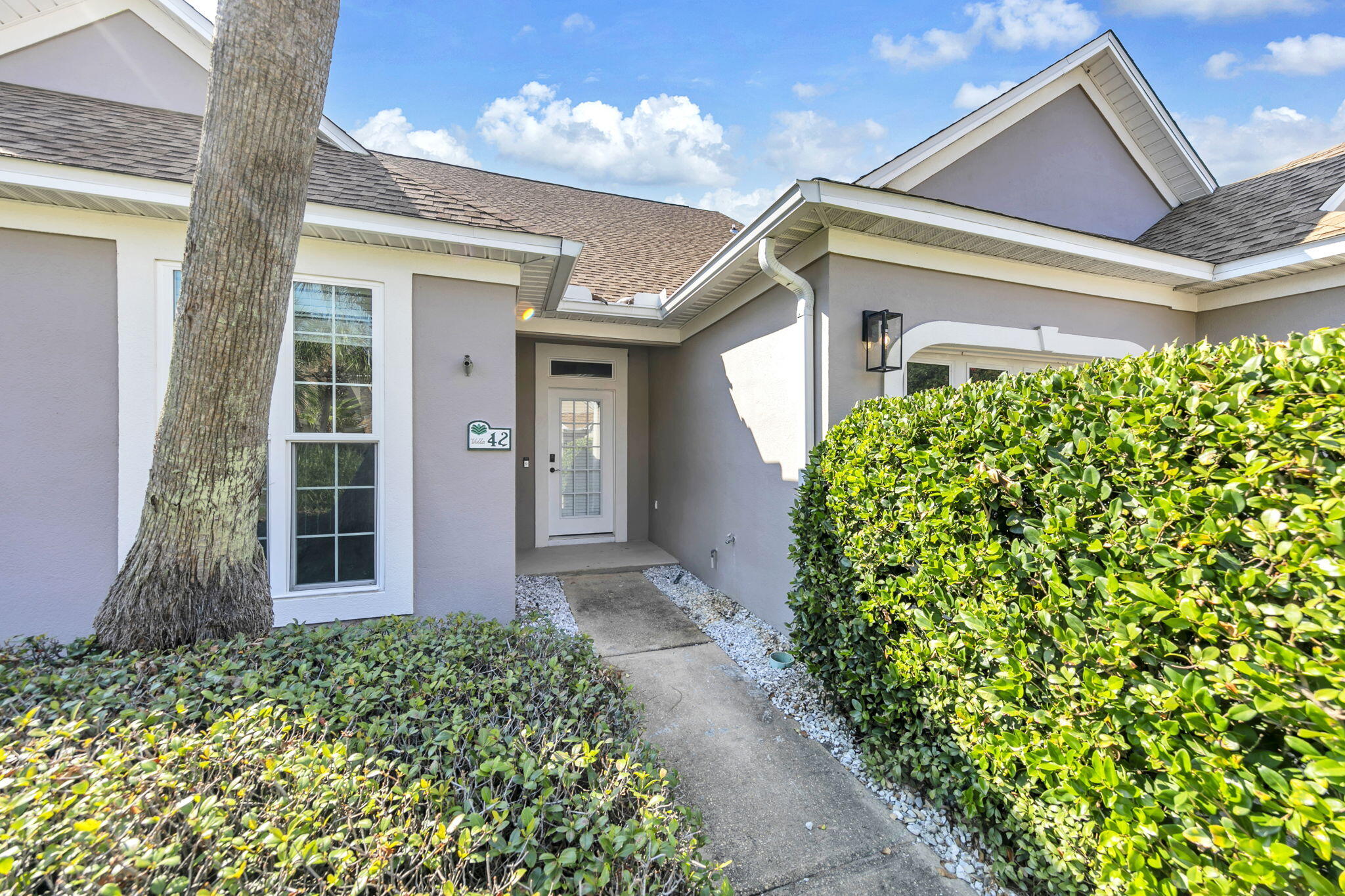 Welcome to Unit 42 at 126 S Shore Dr! This 1998 build is fully updated and offers 3 bedrooms, 2 baths, a large loft area, and over 1,750 sq ft of modern living. The home features a one-car garage, screened-in back patio, dedicated laundry area, a split bedroom floorplan with a gas fireplace, and a community pool. Upon entering the foyer, you'll be welcomed with luxury vinyl plank flooring and updated fixtures throughout. The living room and dining areas offer plenty of room for entertaining and flow seamlessly into the kitchen. The updated kitchen flows into a breakfast nook flooded with natural light and features granite countertops, stainless steel appliances, and white shaker-style cabinets. The primary bedroom includes two closets and an en-suite bathroom with custom tile flooring... ...an updated dual vanity, and a shower/tub combo with floor-to-ceiling tile. The two additional bedrooms share a second full bathroom upstairs, along with the massive flex space that the loft offers. Roof, HVAC, and water heater all installed in 2022, so you can enjoy stress free ownership. Conveniently located near the SilverSands Premium outlets, restaurants, and the white sands of the Emerald Coast. Call to schedule a showing today!