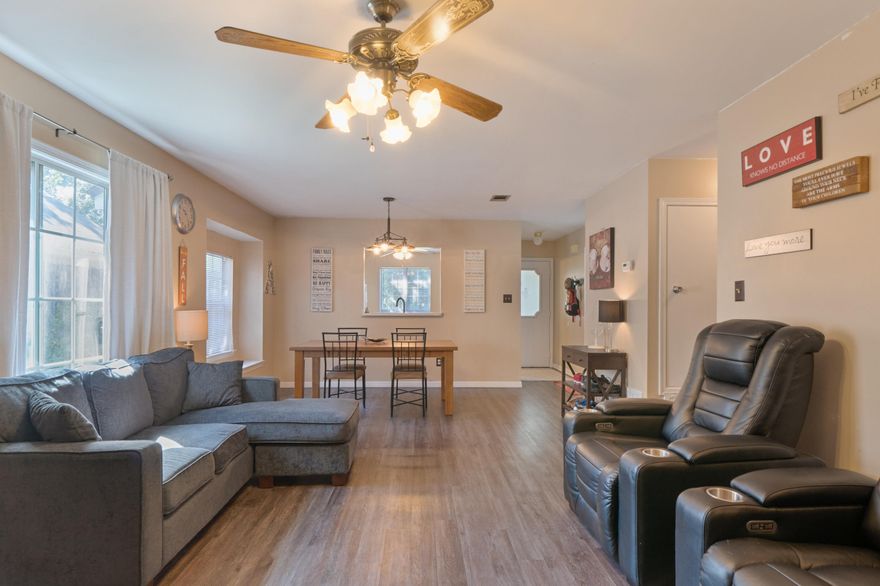 Welcome to your new 3 bedroom, 2 bath ranch home that features a 2 car garage. The seller will pay up to $7,000 of YOUR closing costs! Located in the heart of Fort Walton Beach, this home is everything your family wants. Dark plank flooring stretches throughout the kitchen, dining room, living room with fireplace, hallways and all the bathrooms. The master bedroom suite and master bath are both oversized with a dressing area with dual vanities and dual closets. The open floorplan concept living room, kitchen and dining room is designed for entertaining. The large living room has a wood burning fireplace. The backyard is large enough to play football, cornhole or adding a pool. The 2 car garage has storage and access to the large attic. You're minutes from both military bases. Don't wait!