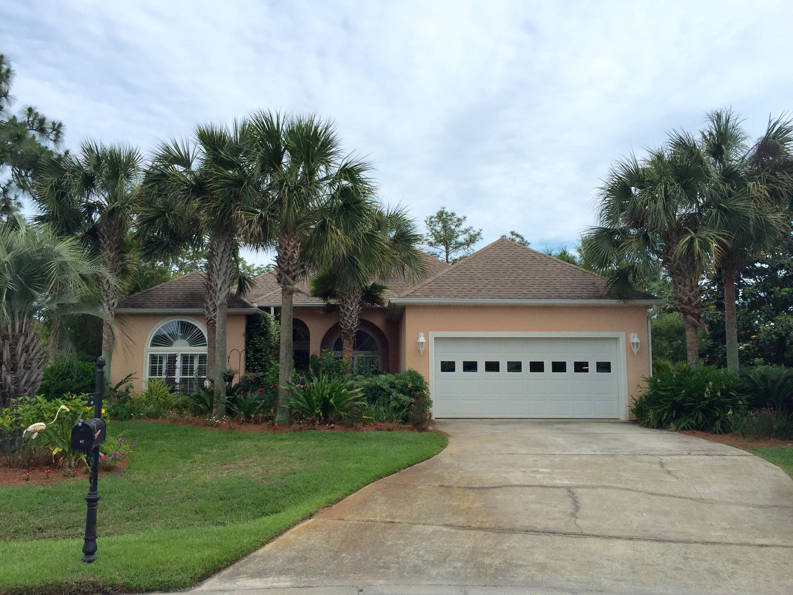 Custom home on CULDESAC in GATED subdivision. Beautifully landscaped and backing up to PRESERVE area. You will see the pride in ownership when viewing this home. Highly sought after open floor plan with TRAVERTINE flooring through out the living areas. The owners enjoy the BUILT-IN entertainment center with lots of storage. Living area has a beautiful GAS FIREPLACE and WET-BAR. PLANTATION SHUTTERS throughout. Large master suite with two closets. Master bath includes double vanity with dressing table. Nice walk-in, tiled shower and your bath water will never get cold because the tub is HEATED. Two nice size additional bedrooms are located on the opposite of this home. You will enjoy cooking on your GAS/electric stove. Light color custom cabinets line the kitchen.