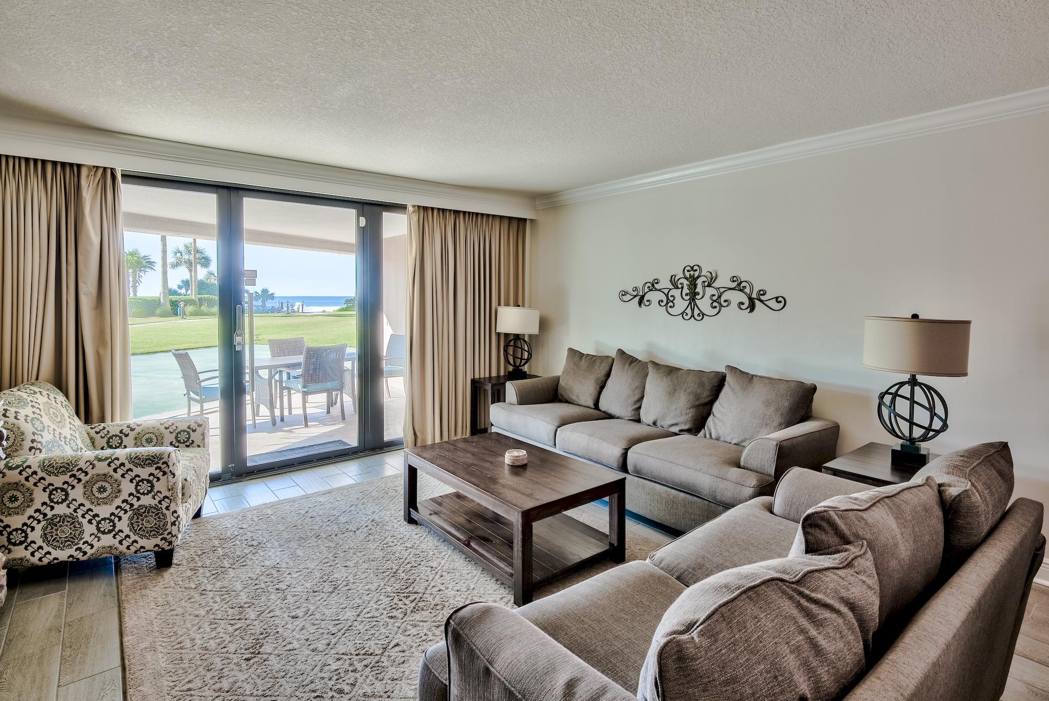 Fantastic 2-bedroom, 2-bath ground floor unit with an expansive patio offering serene views of the Gulf and easy access to the beach, pool, and playground. The floor to ceiling sliding glass doors & windows enhance the Gulf views even more and offer great natural light. Access the large patio from the living area and master bedroom, the perfect place to relax, dine or entertain. Tile floor extends throughout the entire unit for easy maintenance. This unit comes fully furnished and would make a perfect full-time residence or rental investment. Edgewater offers multi level pools, hot tub, tiki bar & grill , playground, basketball, shuffleboard, fitness center, plenty of green space, and a private beach to enjoy. The open floor plan gives the unit a spacious feel and makes entertaining easy. The kitchen features a large wraparound breakfast bar, granite countertops, tile backsplash, stainless steel appliances, and plenty of storage with ample cabinets and a pantry. The split bedroom floor plan offers extra privacy for the master bedroom. The master suite has direct access to the patio, king bed, and en-suite bathroom. The guest bedroom features a king bed and twin bed to maximize the sleeping capacity. This unit offers a laundry closet with full-size washer & dryer and shelving for extra storage.
Edgewater amenities include multi level Gulf front pools (one with a waterfall feature and one seasonally heated), hot tub, tiki bar & grill, playground, basketball, shuffleboard, fitness center, two levels of underground parking, security gate, and a private beach to enjoy with beach service March through October (guests receive 1 umbrella & 2 lounge chairs). At Edgewater you are ideally located within half a mile from Silver Sands Premium Outlets for shopping, near many fantastic restaurants, and plenty of fun entertainment options. The Emerald Coast is home to some of the world's most beautiful beaches and unit 201 gives you quick & easy access to the sugar-white sand & shimmer waters of the Gulf! Take advantage of this incredible opportunity to own your very own slice of paradise today!