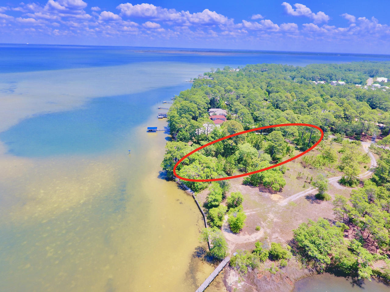 Nestled among the trees of Hewett Point Road, this expansive waterfront lot offers beautiful views with endless opportunity for the nature lover and fishing/water enthusiast alike . Enjoy over 213 feet of waterfront peninsula with views of the Choctawhatchee Bay and Hogtown Bayou. This peaceful and secluded paradise is located towards the end of the dead end street. This lot is located less than three miles away from Sacred Heart Hospital on the Emerald Coast, less than five miles from the beautiful beaches of Highway 30A and minutes away from Grand Boulevard and San Destin. Enjoy close proximity to many of the areas wonderful attractions, destinations, amenities and services.