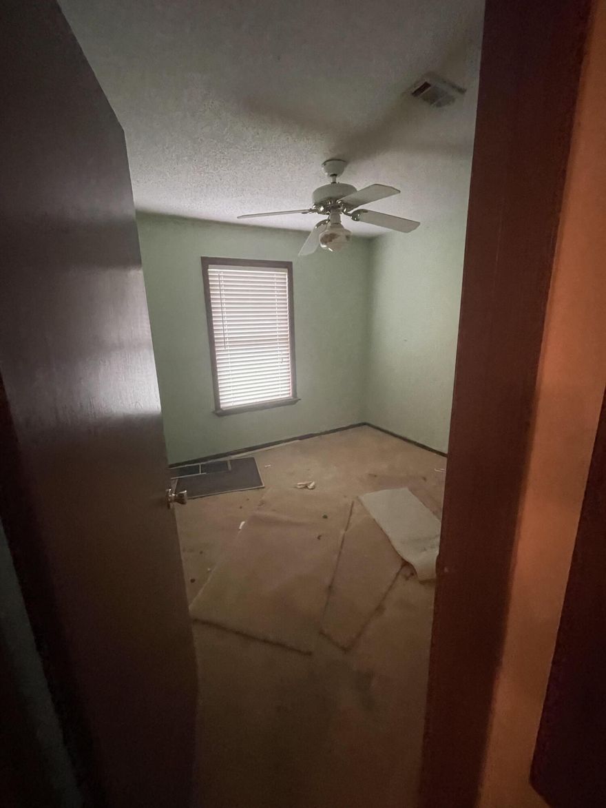 Hard to find 3 bedroom, 2 bath home on 1 acre with lovely lake view. Conveniently located with easy access to Hwy 85 or Airport Road. Schools, grocery store, post office only minutes away. All this with an affordable price. Make this one yours today.