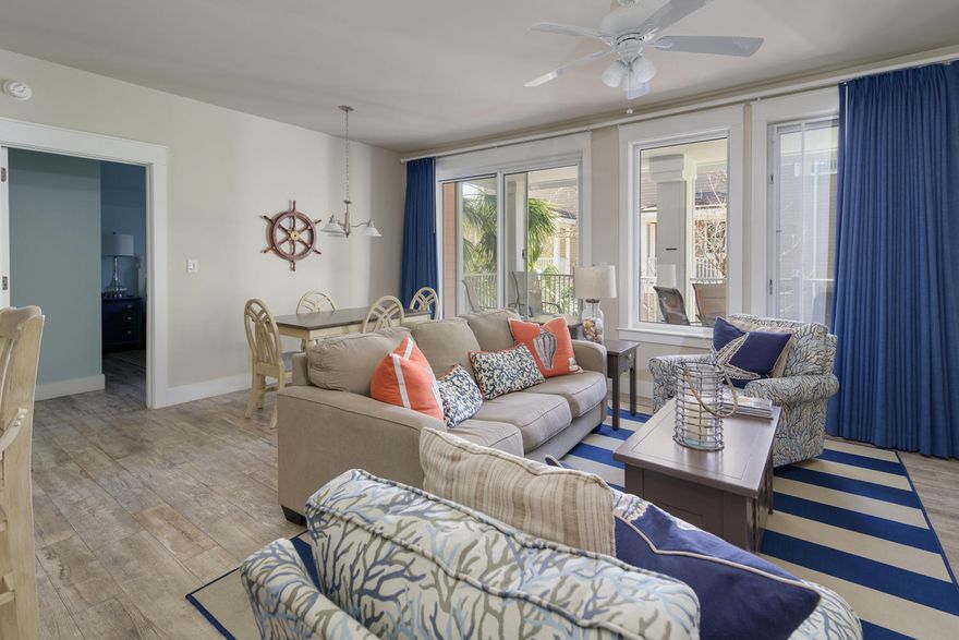 Beautifully updated Market Street Inn condo located in the Village of Baytowne Wharf. Sold Furnished. This lockout condo allows for maximum rental - jointly as a 2 bedroom or separately as a 1 bedroom and a studio. In 2013, this beautiful condo was completely repainted including all kitchen and bathroom cabinets, all flooring was replaced with gorgeous wood grain, tile planks (variable width), both HVAC units were replaced, new flat screen TVs were hung and some new furniture and decor added. In 2015, all new stainless kitchen appliances were added. In 2016 all new mattresses were added and more new furnishings. Enjoy relaxing outdoors on your spacious balcony! This resort home is centrally located near shops, restaurants, Sandestin Tennis Center and a 123-slip marina, a 123-slip marina  a fully equipped and professionally staffed fitness center and spa, and meeting spaces and The Village of Baytowne Wharf, a charming pedestrian village with events, shopping, dining, family entertainment and nightlife. For true golf cart community living, Grand Boulevard is just outside the resort gates and provides access to additional shopping, dining and entertainment - all without traveling on Hwy. 98. Come to Play, Stay for Life! As an introduction to the Sandestin lifestyle, we invite our new owners to explore amenities that make Sandestin special. The listing brokerage and seller(s) are presenting the buyer(s) of this property with (2) 90-minute rounds of Tennis court time, a golf foursome at one of our three championship courses, and a round of golf for up to four (4) players at the unrivaled Burnt Pine Golf Club.