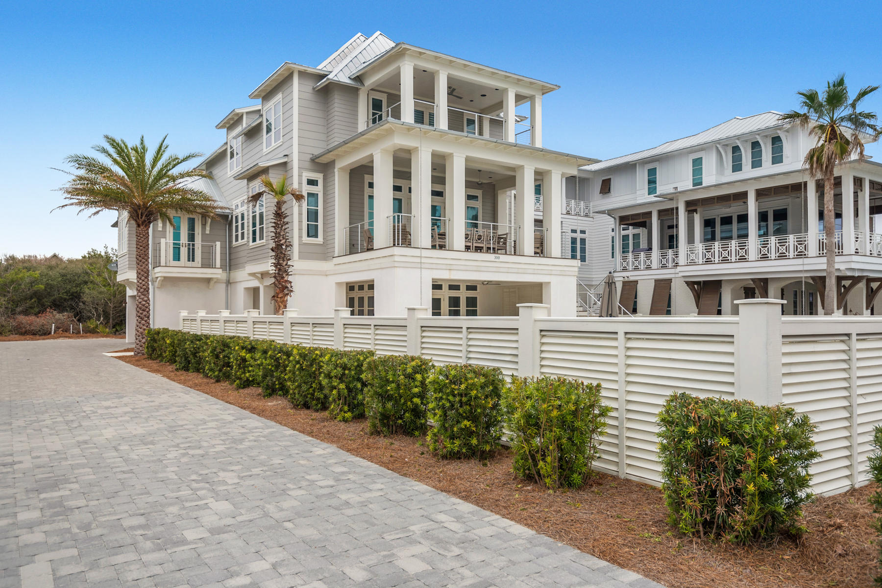 Enjoy vast views of the Gulf of Mexico from your private balcony, float the day way in your heated pool with a luxurious cascading waterfall or relax and unwind with an evening drink in your exquisite gourmet kitchen. Located in Inlet Beach, this home has a seamless flow of indoor / outdoor living from the exterior summer kitchen and expansive pool deck to the large Cabana Room where you will find classic details and a large open floor plan.This piece of paradise also comes with finely appointed finishes such as quartz countertops, white shiplap walls, sanded Walnut hardwood floors, stainless steel kitchen Thermador appliances, a gas fireplace with Coquina shell and marble tile accents throughout.