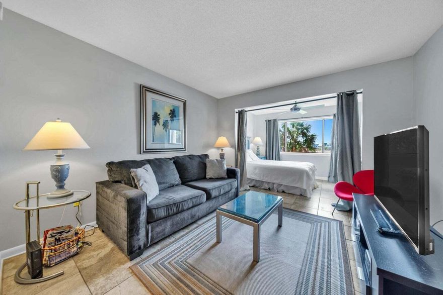Back on market at no fault to the seller. This charming 1 bed, 1 bath studio condo is rental-ready--fully furnished with everything you need for an effortless beach escape or short-term rental gem. The living room features a sleeper sofa for two, perfect for hosting guests, while the bedroom nook offers a queen-size bed. Sunset Harbor offers a community pool, boat parking, a private fishing pier, and a water side pavilion with grills for cooking and dining outdoors. Each building has an elevator. This is the perfect location for catching the best sunsets on Navarre Beach. Located on the sound this unit is just a short walk or fun golf cart ride to the Gulf. This unit is currently part of a rental program-the perfect opportunity to snag an investment before peak season.