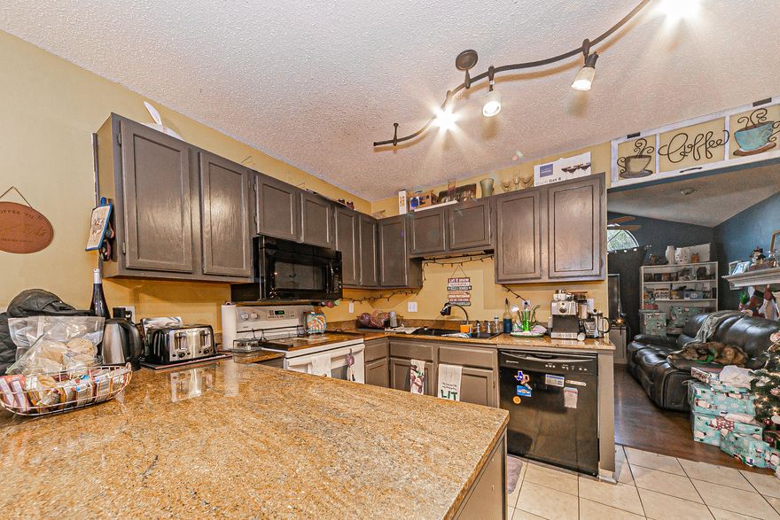 Charming 3 bedroom/2 bath home located in Northwest Fort Walton Beach behind Walmart, close to shopping, Hurlburt and Eglin, and the college. The home features an attached 2 car garage, central wood fireplace, vaulted ceiling, walk in closet in the master bedroom, his & her vanities in the master bath, wood flooring, tiled kitchen and master bath, kitchen includes granite counters, and a lovely back patio.  Large amounts of storage space! Plus a fenced backyard!