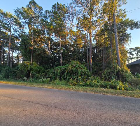 Photo of 8149 Escola Street, Navarre, FL 32566 (MLS # 987729)